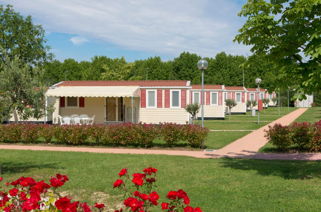 camping site with rows of identical mobile homes